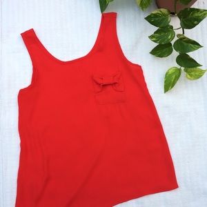 Mezzanine Francesca's red sleevelessTop with front pocket